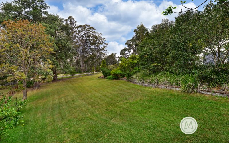 ULTIMATE TRANQUIL SETTING - APPROACHING AN ACRE IN SIZE!