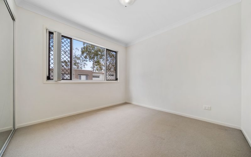 VACANT TOWNHOUSE WITH HOUSE LIKE PROPORTIONS & AFFORDABLE BODY CORPORATE FEES - OWNER SAYS SELL!