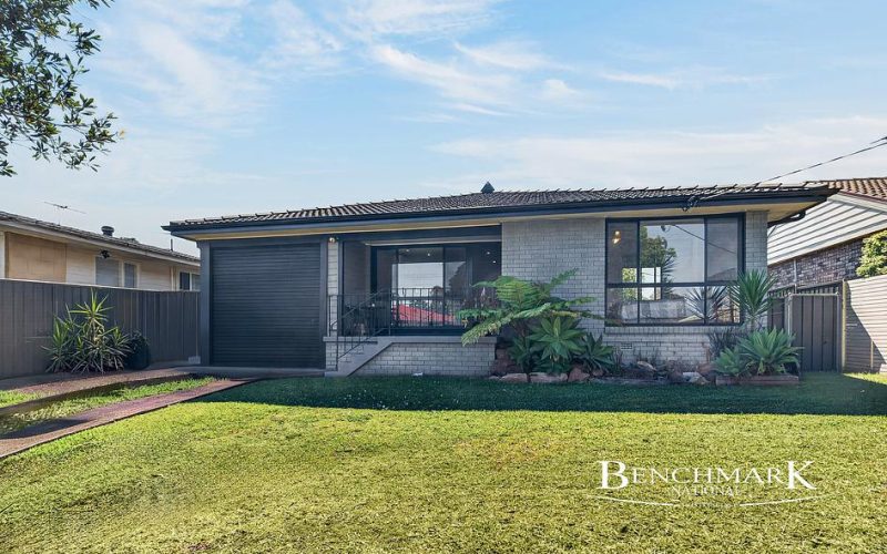 Three-Bedroom Brick Home with a Poolside Retreat