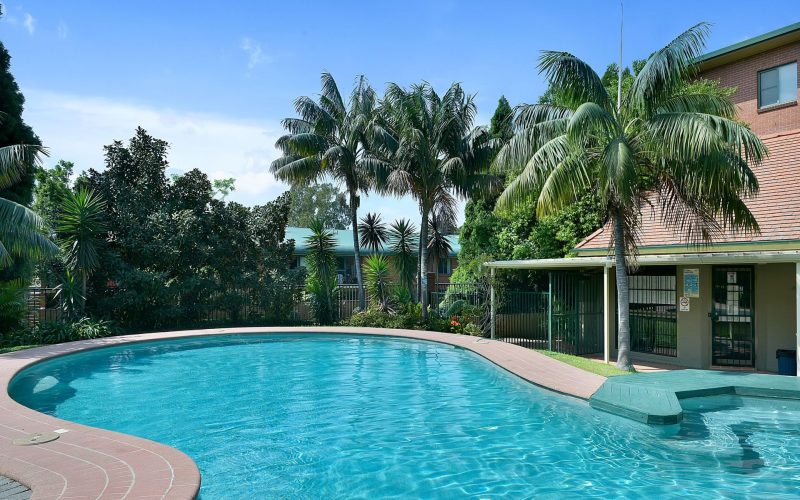 103sqm North facing two bedroom apartment w/ parking + city skyline views