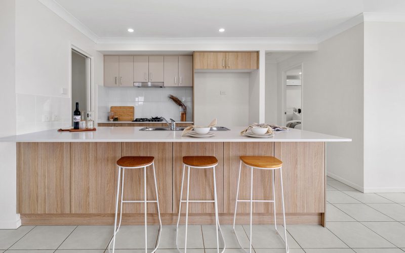Split-Plan Family Home with Double-Island Kitchen and Fenced Yard