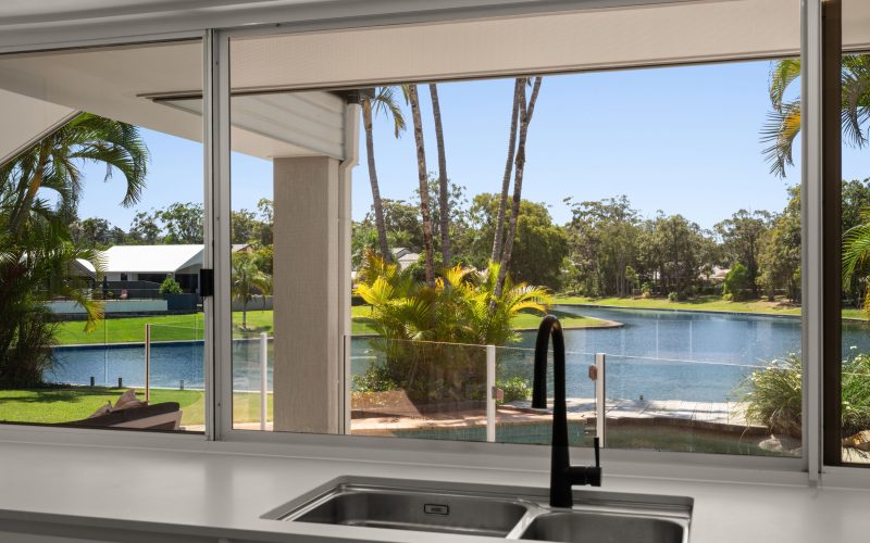 Private Waterfront Living with Soaring Ceilings & Endless Space