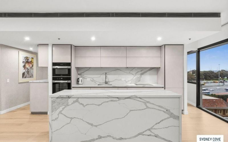 LUXURIOUS ONE BEDROOM APARTMENT WITH OPERA HOUSE VIEWS & TWO CAR SPACES