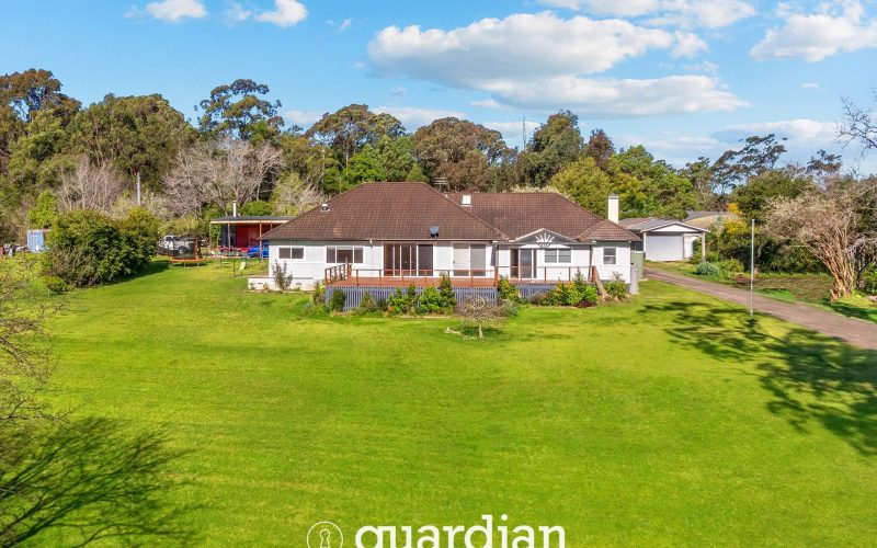 Private Acreage Retreat with Dual Living