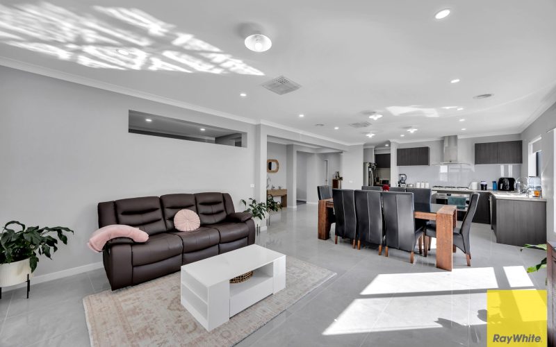 Stylish Henley Home with Premium Upgrades & Outstanding Convenience